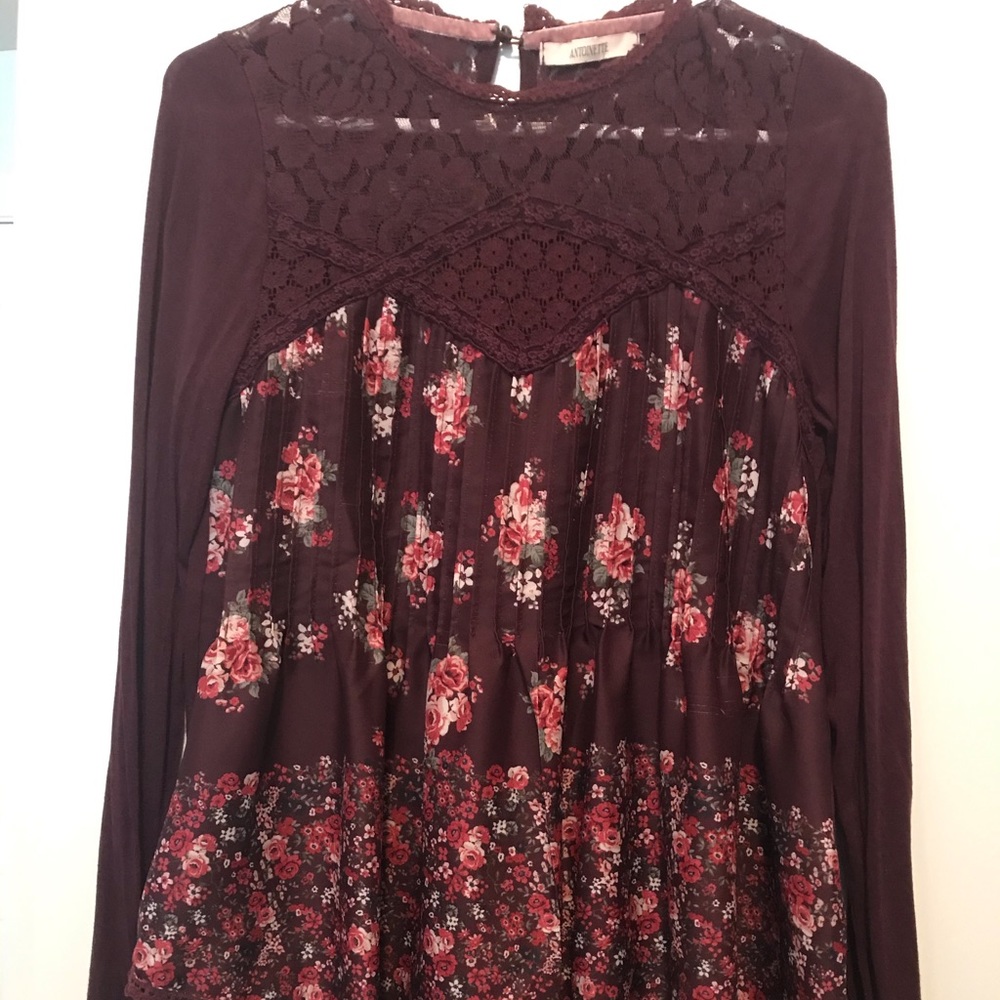 Floral print flowy top with cute details